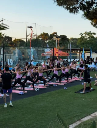 Outdoor summer yoga session at @ensosportsclubathens